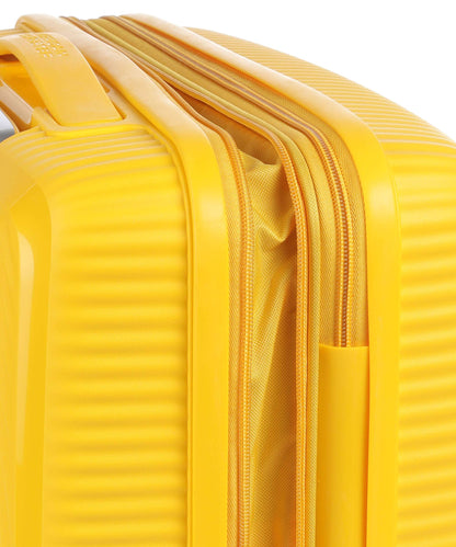 American Tourister Soundbox 4-Rollen Trolley golden yellow